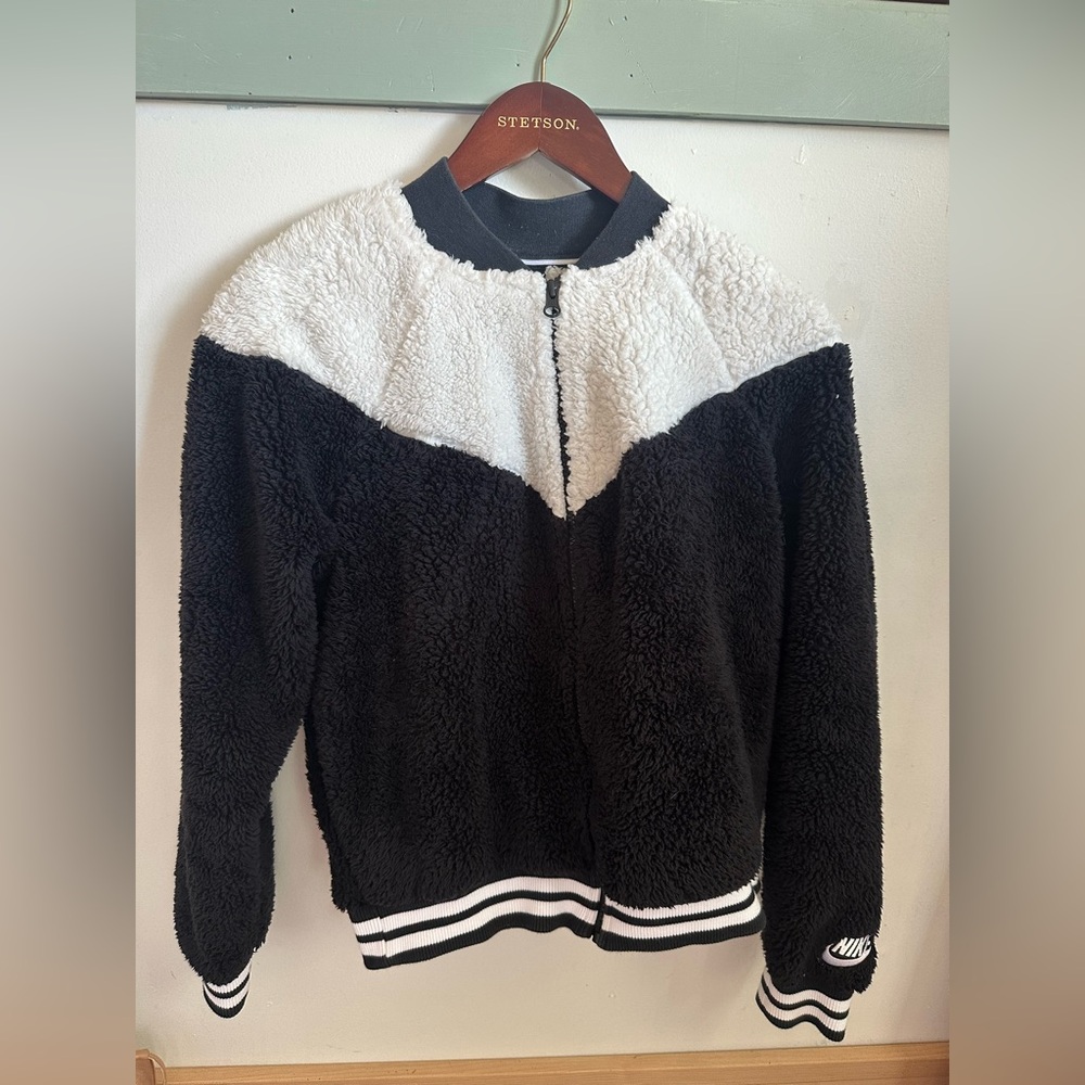 White and black zip up Nike